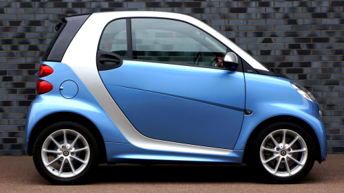 a car parked in front of a building